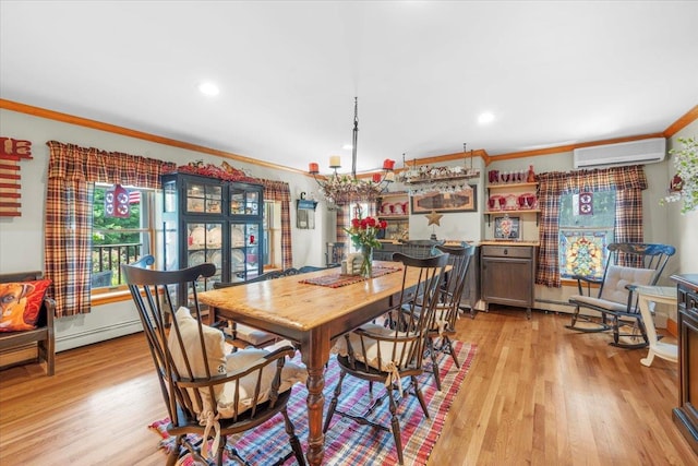 278 Gibson Hill Rd, Chester, NY 10918 - dining room with a wall unit AC, ornamental molding, light wood-style flooring, a chandelier, and baseboard heating