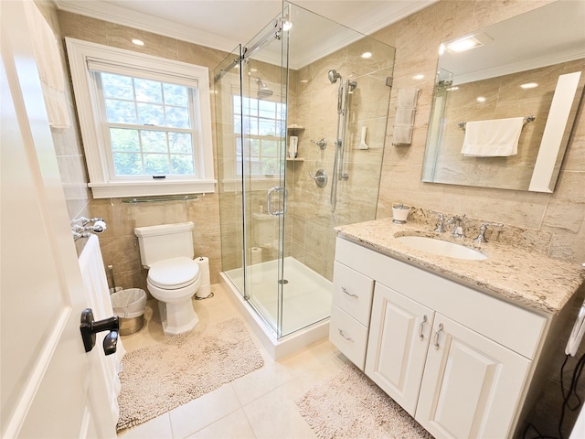 352 Mill Spring Rd, Manhasset, NY 11030 - bathroom with tile walls, tile patterned flooring, vanity, a shower stall, and toilet
