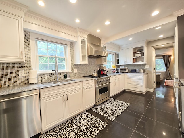 352 Mill Spring Rd, Manhasset, NY 11030 - kitchen with appliances with stainless steel finishes, wall chimney exhaust hood, open shelves, backsplash, and a sink