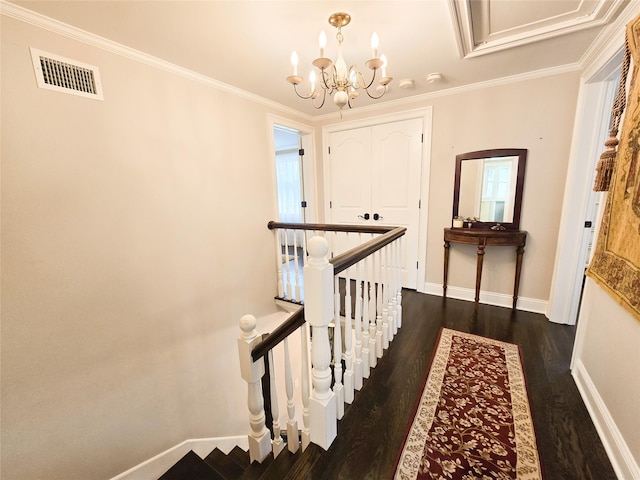 352 Mill Spring Rd, Manhasset, NY 11030 - hall with an upstairs landing, dark wood-type flooring, baseboards, a chandelier, and ornamental molding