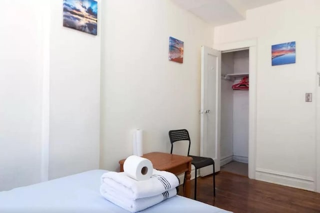 3317 87th St, Jackson Heights, NY 11372 - bedroom with wood finished floors and a closet