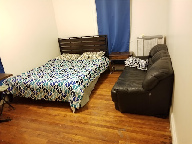 3317 87th St, Jackson Heights, NY 11372 - bedroom featuring wood finished floors