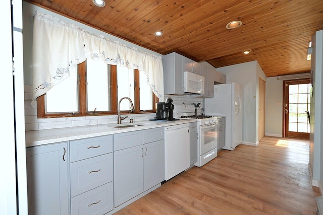 187 Smith Ave, Islip, NY 11751 - kitchen with white appliances, wood ceiling, tasteful backsplash, recessed lighting, and light wood-style flooring