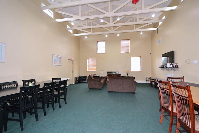 2449 Union Blvd # 39B, Islip, NY 11751 - dining space with a high ceiling, carpet, and beamed ceiling