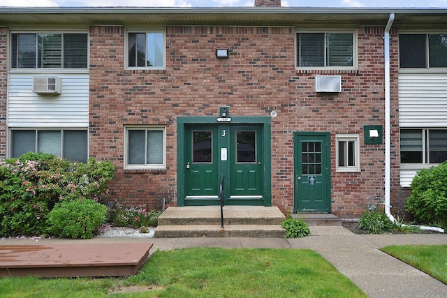 2449 Union Blvd # 39B, Islip, NY 11751 - property entrance featuring brick siding and a chimney