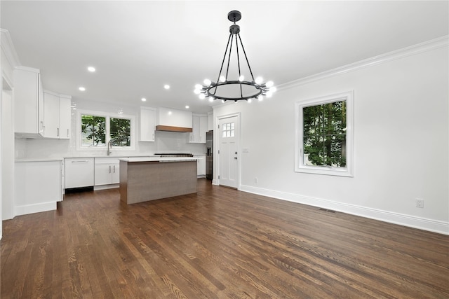 45 Fenimore Rd, New Rochelle, NY 10804 - kitchen featuring a chandelier, a kitchen island, healthy amount of natural light, white cabinetry, and recessed lighting