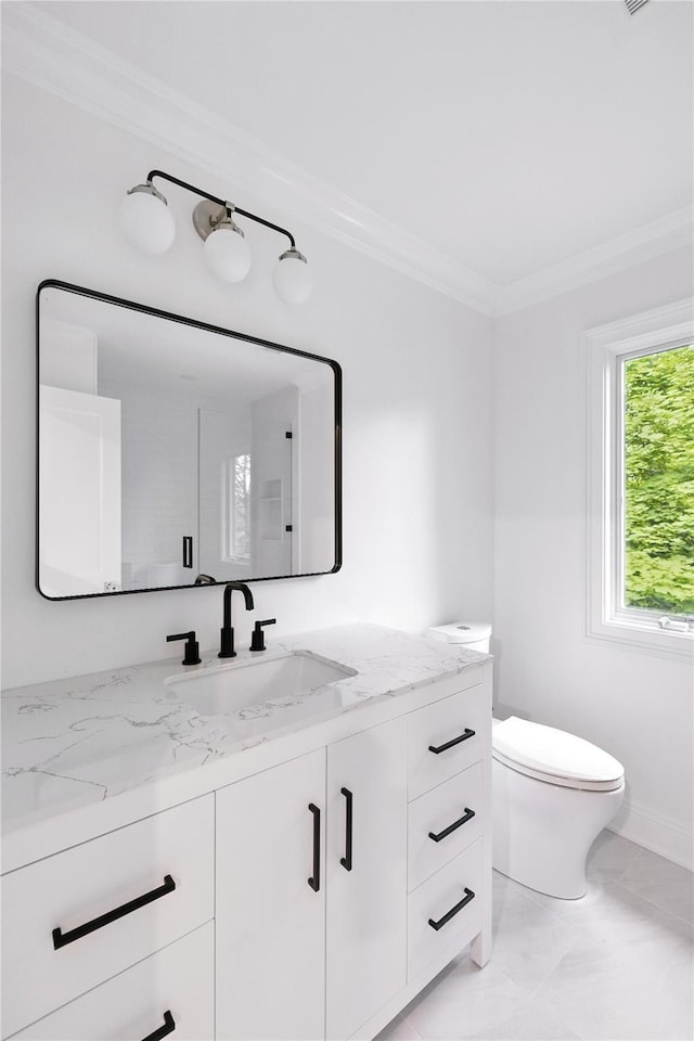 45 Fenimore Rd, New Rochelle, NY 10804 - bathroom featuring vanity, crown molding, and marble look tiles
