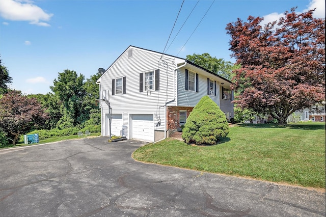 57 Panorama Dr, Patterson, NY 12563 - view of side of property featuring driveway, a garage, and a lawn