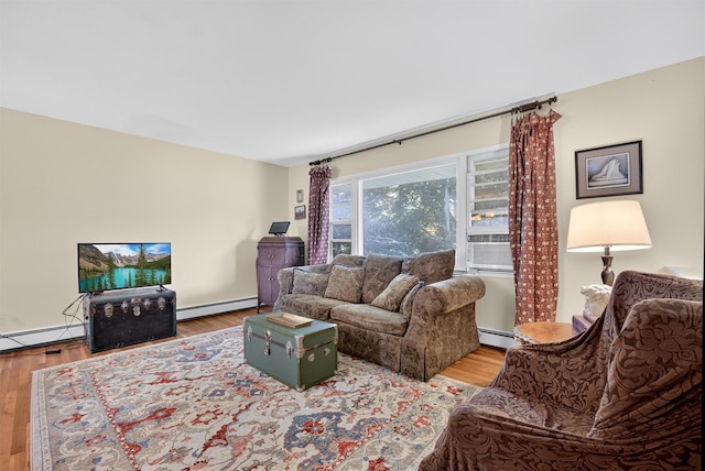 57 Panorama Dr, Patterson, NY 12563 - living room with a baseboard heating unit and wood finished floors