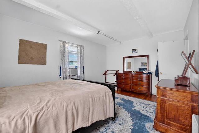 57 Panorama Dr, Patterson, NY 12563 - bedroom with dark wood finished floors and beamed ceiling