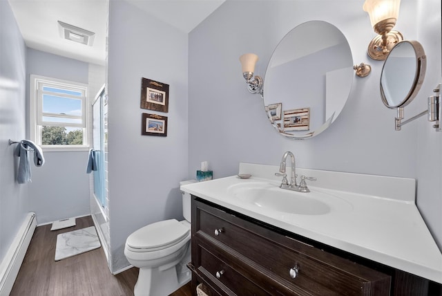 57 Panorama Dr, Patterson, NY 12563 - full bath with a baseboard radiator, wood finished floors, vanity, and shower / bathtub combination