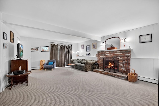 57 Panorama Dr, Patterson, NY 12563 - living room with a baseboard heating unit, carpet flooring, beam ceiling, a baseboard radiator, and a brick fireplace