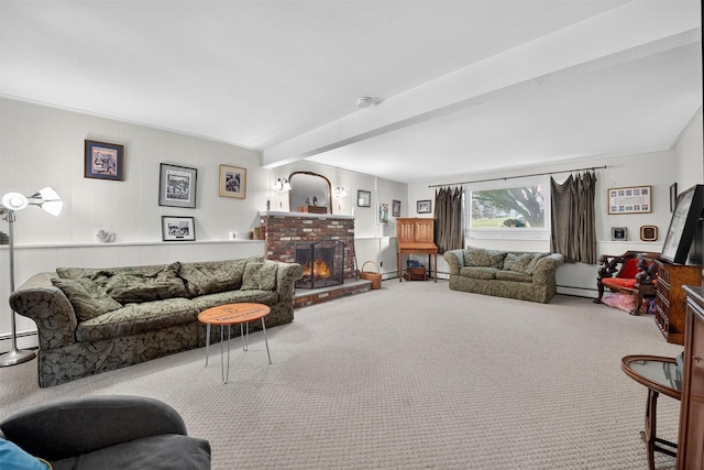 57 Panorama Dr, Patterson, NY 12563 - carpeted living area featuring beamed ceiling, a fireplace, and a baseboard heating unit