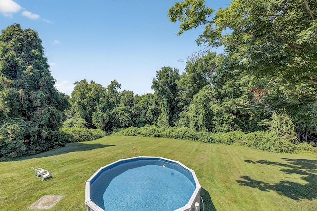 57 Panorama Dr, Patterson, NY 12563 - view of pool with a yard and a view of trees