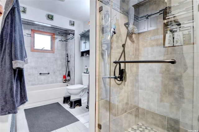 338 Cold Spring Rd, Syosset, NY 11791 - full bathroom featuring toilet, tiled shower / bath, and tile patterned flooring