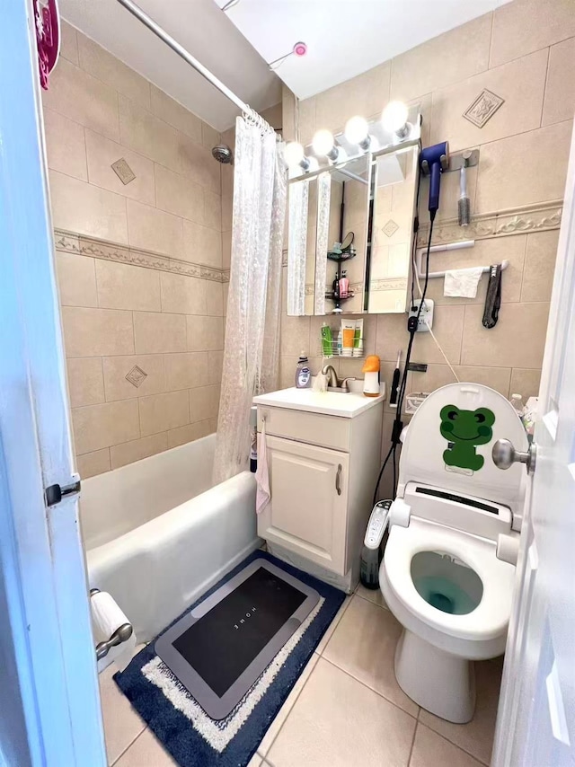 99-05 63rd Dr Unit 14R, Rego Park, NY 11374 - full bathroom with tile patterned floors, vanity, shower / tub combo, tile walls, and toilet