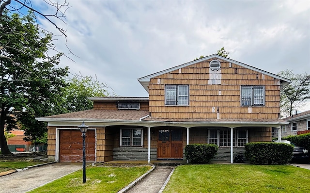 2805 Mott Ave, Far Rockaway, NY 11691 - view of front of house with a garage, a front yard, driveway, covered porch, and roof with shingles