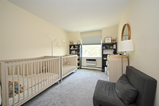 206-05 Emily Rd Unit 6U, Bayside, NY 11360 - carpeted bedroom with a baseboard heating unit