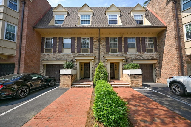 206-05 Emily Rd Unit 6U, Bayside, NY 11360 - view of front facade with a shingled roof and brick siding