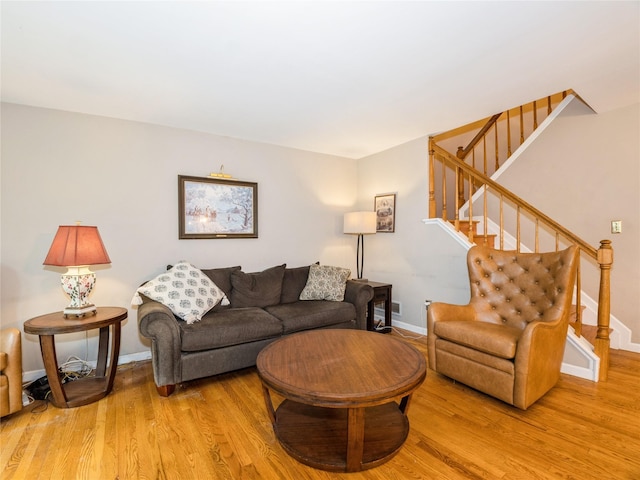 47 Muirfield Ct, Poughkeepsie, NY 12603 - living room with wood finished floors and stairway