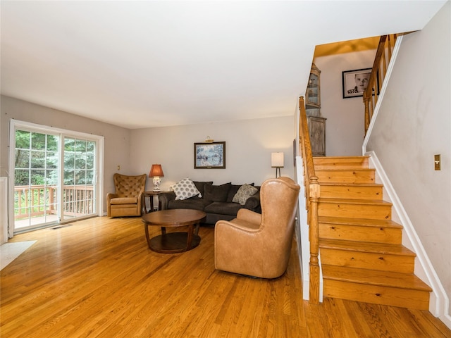 47 Muirfield Ct, Poughkeepsie, NY 12603 - living area featuring wood finished floors and stairs