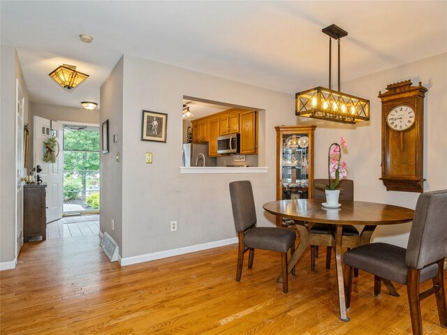 47 Muirfield Ct, Poughkeepsie, NY 12603 - dining room featuring light wood finished floors