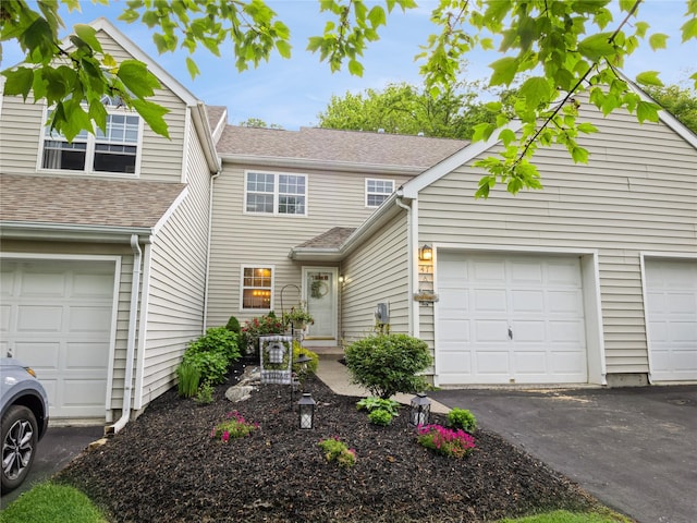 47 Muirfield Ct, Poughkeepsie, NY 12603 - view of front of home with roof with shingles, a garage, and driveway