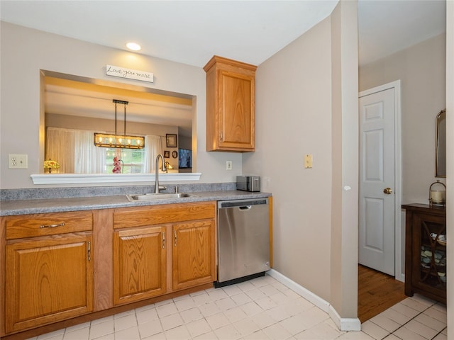 47 Muirfield Ct, Poughkeepsie, NY 12603 - kitchen with dishwasher, brown cabinetry, hanging light fixtures, a chandelier, and light countertops