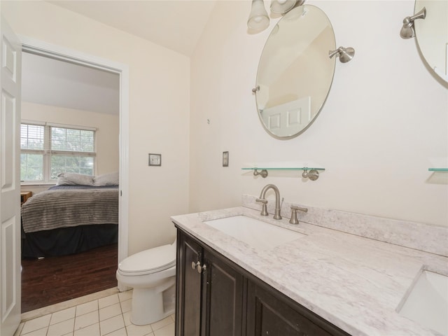 47 Muirfield Ct, Poughkeepsie, NY 12603 - bathroom with tile patterned floors, vanity, and ensuite bath