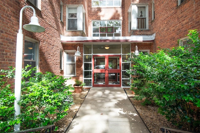 1 Georgia Ave Unit 5A, Bronxville, NY 10708 - doorway to property with french doors and brick siding