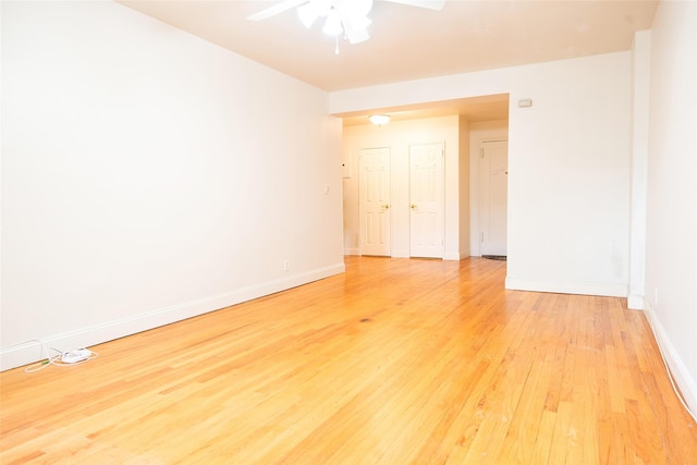 1 Georgia Ave Unit 5A, Bronxville, NY 10708 - spare room featuring ceiling fan, light wood-style floors, and baseboards