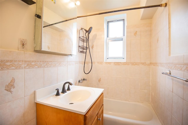 1 Georgia Ave Unit 5A, Bronxville, NY 10708 - bathroom featuring tile walls, vanity, and shower / bath combination