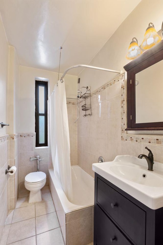 860 Grand Concourse Unit 4J, Bronx, NY 10451 - full bath with tile walls, toilet, vanity, shower / bath combination with curtain, and tile patterned flooring