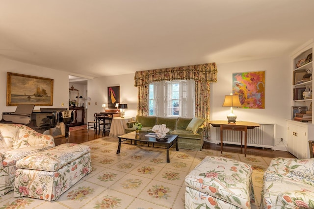 301 Margaret Blvd, Merrick, NY 11566 - living area with radiator heating unit and wood finished floors
