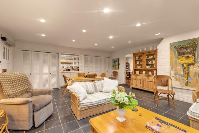 301 Margaret Blvd, Merrick, NY 11566 - living area featuring dark tile patterned flooring and recessed lighting