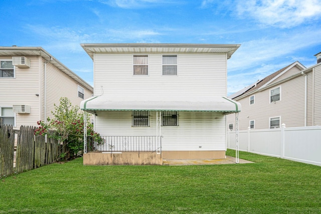 14015 159th St, Jamaica, NY 11434 - back of property featuring a porch and a wall mounted AC