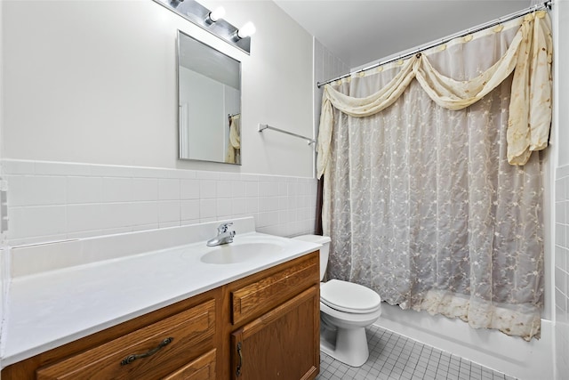 1830 Sterling Pl, Brooklyn, NY 11233 - bathroom with tile patterned floors, vanity, shower / bath combo with shower curtain, toilet, and tile walls