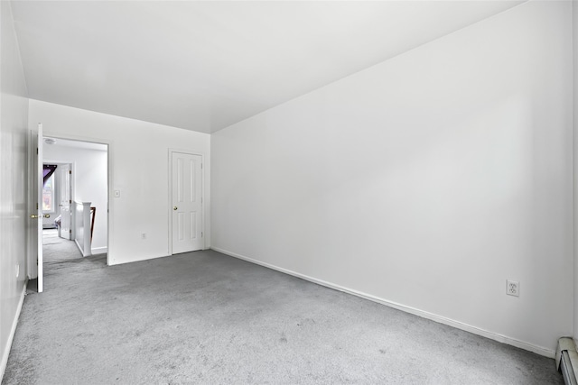 1830 Sterling Pl, Brooklyn, NY 11233 - unfurnished bedroom featuring a baseboard radiator, carpet floors, and baseboards