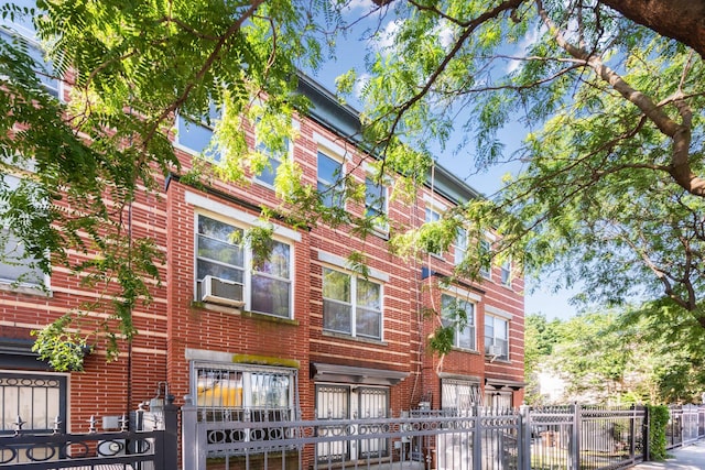 1830 Sterling Pl, Brooklyn, NY 11233 - view of building exterior featuring a fenced front yard