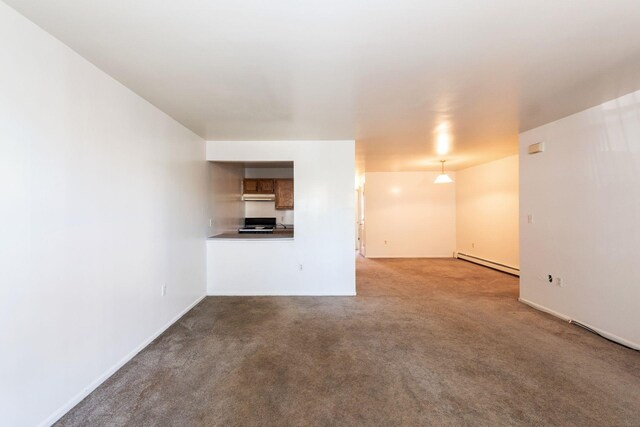 1830 Sterling Pl, Brooklyn, NY 11233 - unfurnished living room with a baseboard radiator, carpet, and baseboards