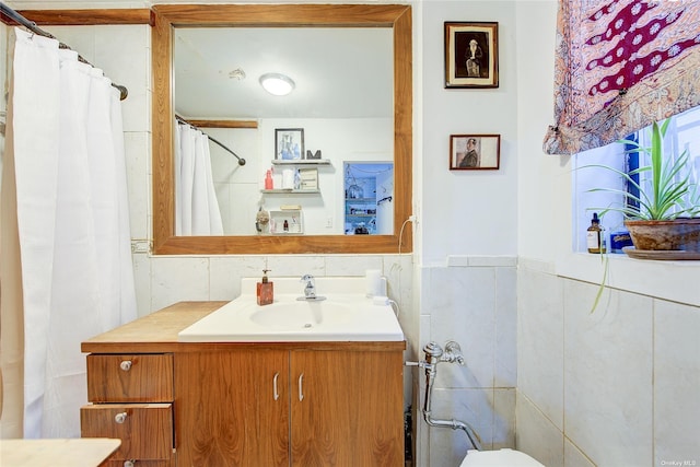230 S 2nd St, Brooklyn, NY 11211 - full bath with vanity, toilet, and tile walls