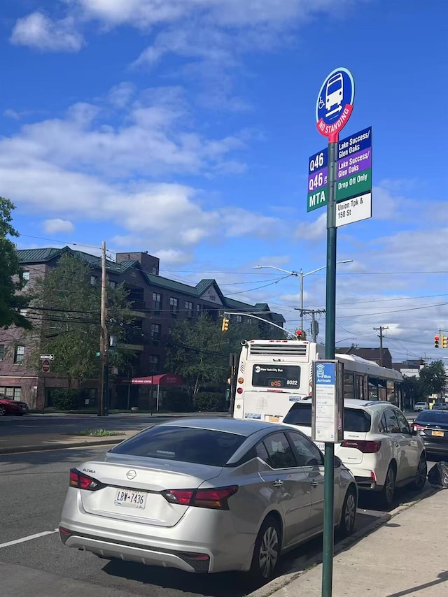 150-38 Union Tpke Unit 11G, Flushing, NY 11367 - view of asphalt road featuring street lighting and traffic lights