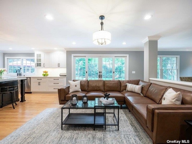 22 Homer Pl, Manhasset, NY 11030 - living room featuring crown molding, french doors, light wood-style flooring, and recessed lighting