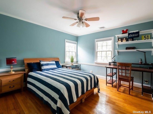 22 Homer Pl, Manhasset, NY 11030 - bedroom featuring ornamental molding and wood finished floors