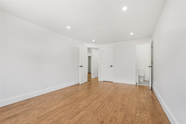 567 E 80th St, Brooklyn, NY 11236 - unfurnished bedroom with recessed lighting, light wood-style floors, ensuite bath, and baseboards