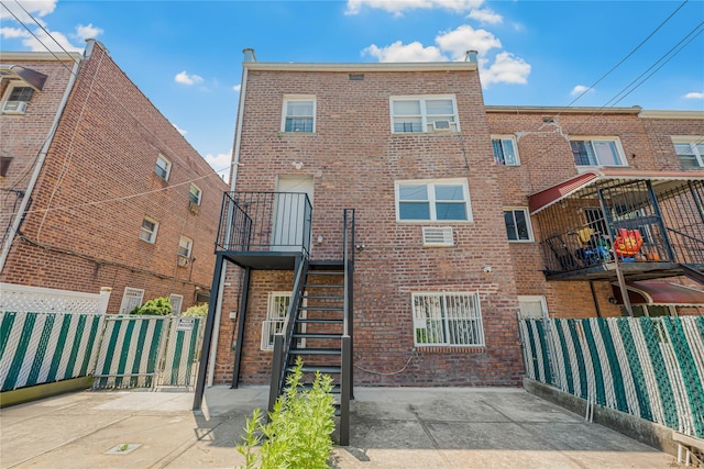 567 E 80th St, Brooklyn, NY 11236 - back of house featuring brick siding