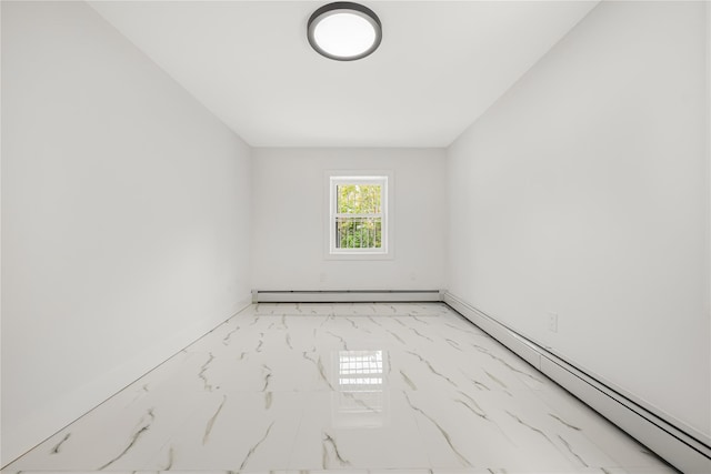 567 E 80th St, Brooklyn, NY 11236 - unfurnished room with marble finish flooring, a baseboard radiator, and baseboards