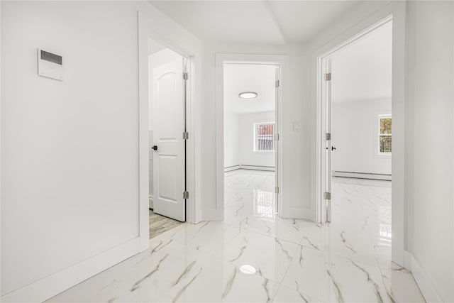 567 E 80th St, Brooklyn, NY 11236 - corridor with marble tiled floors, baseboards, and a baseboard radiator