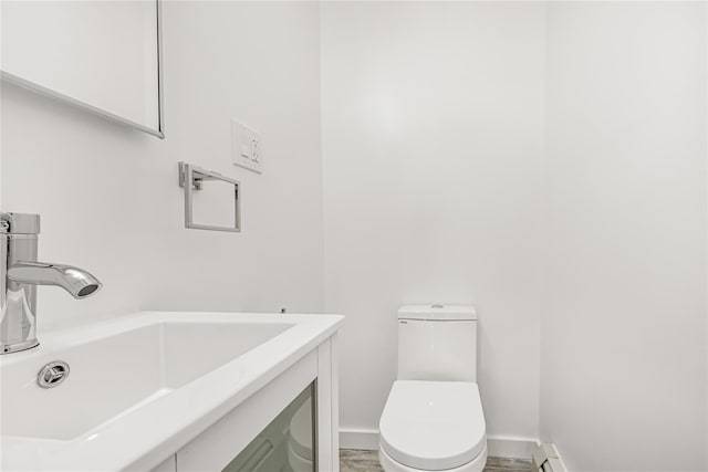567 E 80th St, Brooklyn, NY 11236 - half bath with toilet, baseboards, and vanity
