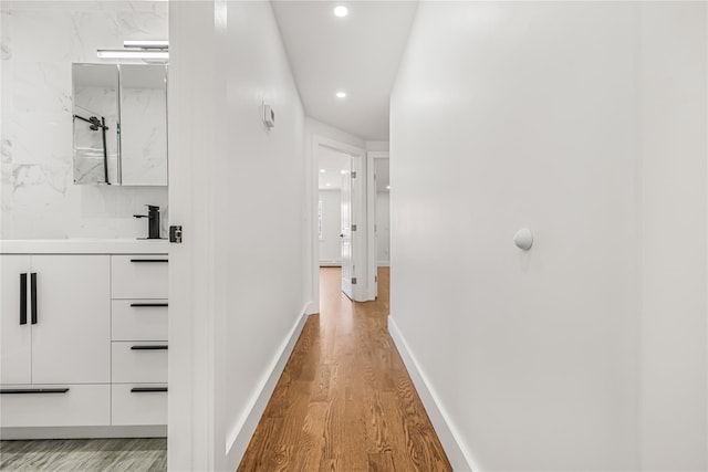 567 E 80th St, Brooklyn, NY 11236 - hallway with recessed lighting, light wood-style flooring, and baseboards